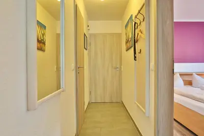 Ein Bett oder Betten in einem Zimmer der Unterkunft Parkresidenz Parkresidenz Appartement 2