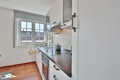 Küche/Küchenzeile in der Unterkunft Haus am Falkenweg Haus am Falkenweg Appartement 6