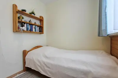 Ein Bett oder Betten in einem Zimmer der Unterkunft Hanseat am Hang 3 - 5 Hanseat Appartement 21