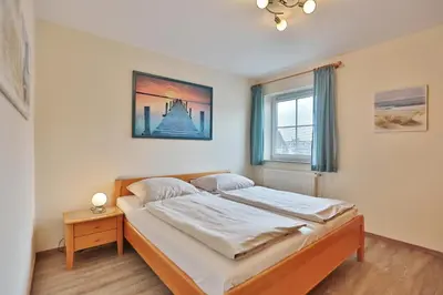 Ein Bett oder Betten in einem Zimmer der Unterkunft Residenz Alte Bergstraße Residenz Alte Bergstrasse Appartement 16