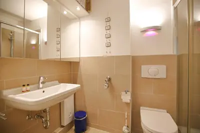 Ein Badezimmer in der Unterkunft Strandperle Strandperle Appartement 403