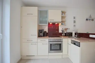 Küche/Küchenzeile in der Unterkunft Haus Küstenkinder Haus Küstenkinder Marie Appartement 1