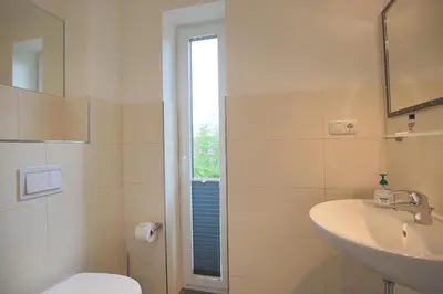 Ein Badezimmer in der Unterkunft Haus Küstenkinder Haus Küstenkinder Louis Appartement 2