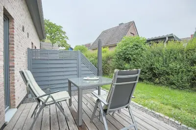 Ein Garten an der Unterkunft Haus Küstenkinder Haus Küstenkinder Louis Appartement 2
