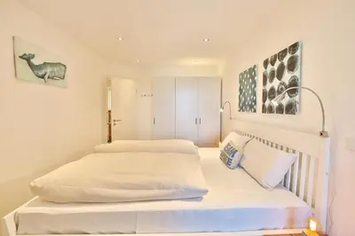 Ein Bett oder Betten in einem Zimmer der Unterkunft Residenz Ostseestrand Appartement 14