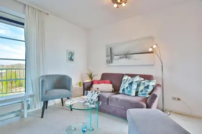 Ein Sitzbereich in der Unterkunft Strandresidenz Haffkrug Strandresidenz Appartement 6