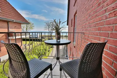 Ein Balkon oder eine Terrasse in der Unterkunft Strandresidenz Haffkrug Strandresidenz Appartement 6