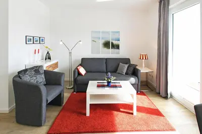 Ein Sitzbereich in der Unterkunft Strandglück Haus B Strandglück Appartement 8B