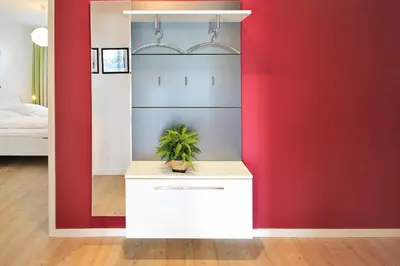 Ein Bett oder Betten in einem Zimmer der Unterkunft Strandglück Haus B Strandglück Appartement 8B