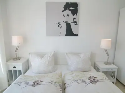 Ein Bett oder Betten in einem Zimmer der Unterkunft Strandglück Haus A Strandglück Appartement 7A