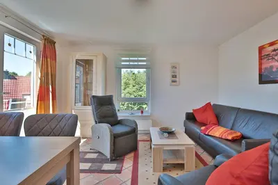 Ein Sitzbereich in der Unterkunft Feriendomizil am Konsulweg Feriendomizil am Konsulweg Appartement 7