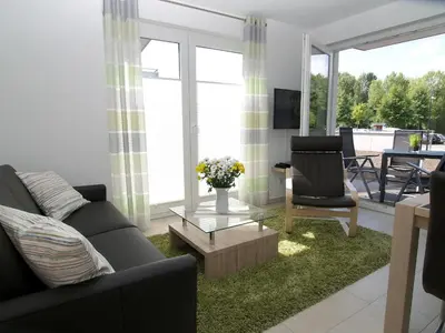 Ein Sitzbereich in der Unterkunft Strandglück Haus B Strandglück Appartement 4B