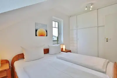 Ein Bett oder Betten in einem Zimmer der Unterkunft Reihenhaus Eichenweg Reihenhaus Eichenweg Appartement 8