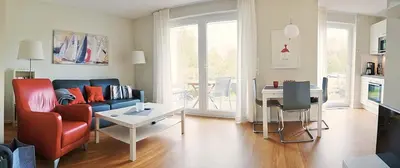 Ein Sitzbereich in der Unterkunft Strandglück Haus C Strandglück Appartement 3C