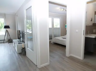 Ein Bett oder Betten in einem Zimmer der Unterkunft Strandglück Haus C Strandglück Appartement 2C