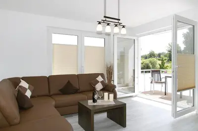 Ein Sitzbereich in der Unterkunft Strandglück Haus C Strandglück Appartement 09C