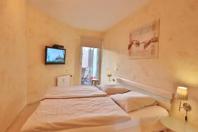 Ein Bett oder Betten in einem Zimmer der Unterkunft Residenz Ostseestrand Appartement 2