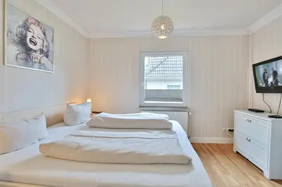 Ein Bett oder Betten in einem Zimmer der Unterkunft Ferienhaus Ragna Ferienhaus Ragna Appartement 1
