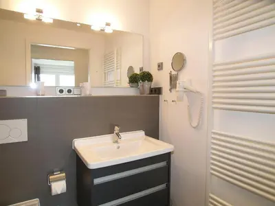Ein Badezimmer in der Unterkunft Strandglück Haus B Strandglück Appartement 15B