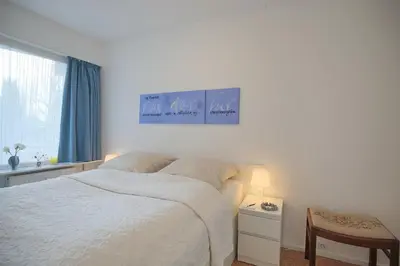 Ein Bett oder Betten in einem Zimmer der Unterkunft Residenz am Hang Residenz am Hang Meertraum Appartement 109