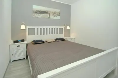Ein Bett oder Betten in einem Zimmer der Unterkunft Residenz am Hang Residenz am Hang Appartement 321