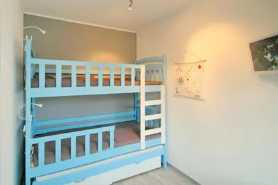 Ein Bett oder Betten in einem Zimmer der Unterkunft Residenz am Hang Residenz am Hang Appartement 321