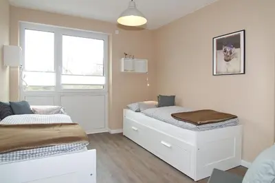 Ein Bett oder Betten in einem Zimmer der Unterkunft Kurparkresidenz Kurparkresidenz Appartement 13