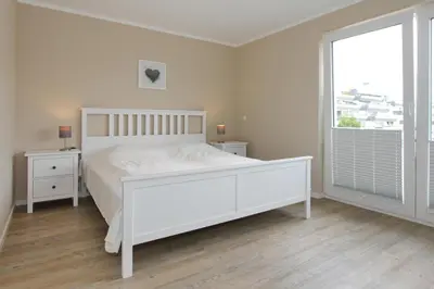 Ein Bett oder Betten in einem Zimmer der Unterkunft Strandglück Haus C Strandglück Buhne 11 Appartement 11C