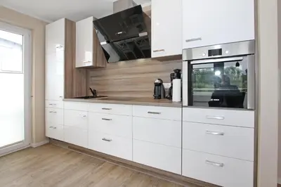 Küche/Küchenzeile in der Unterkunft Strandglück Haus C Strandglück Buhne 11 Appartement 11C