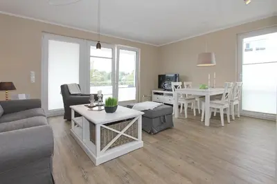 Ein Sitzbereich in der Unterkunft Strandglück Haus C Strandglück Buhne 11 Appartement 11C