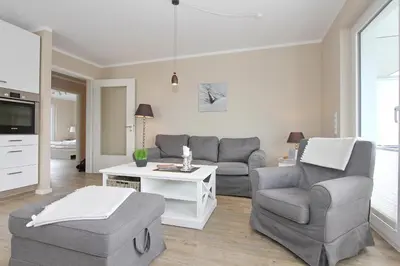 Ein Sitzbereich in der Unterkunft Strandglück Haus C Strandglück Buhne 11 Appartement 11C