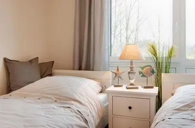 Ein Bett oder Betten in einem Zimmer der Unterkunft Kurparkresidenz Kurparkresidenz Appartement 16