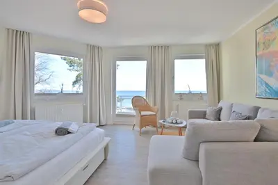 Ein Sitzbereich in der Unterkunft Feriendomizil Strandblick Feriendomizil Strandblick Appartement 1 MeerBlick