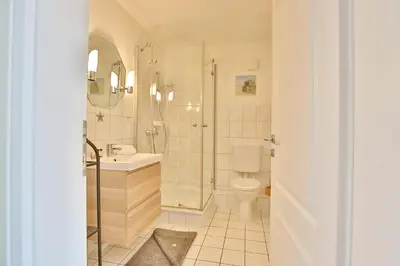 Ein Badezimmer in der Unterkunft Feriendomizil Strandblick Feriendomizil Strandblick Appartement 1 MeerBlick