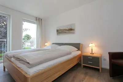 Ein Bett oder Betten in einem Zimmer der Unterkunft Kurparkresidenz Kurparkresidenz Appartement 18
