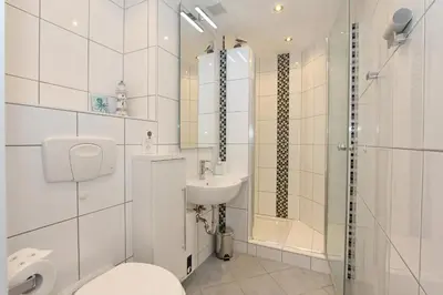 Ein Badezimmer in der Unterkunft Seetempel Seetempel Appartement 45