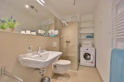 Ein Badezimmer in der Unterkunft Strandglück Haus C Strandglück Appartement 7C
