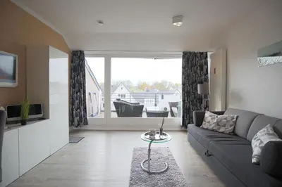 Ein Sitzbereich in der Unterkunft Haus Adria Haus Adria Appartement 26