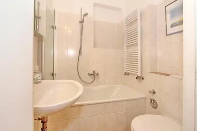 Ein Badezimmer in der Unterkunft Haus an der Strandallee 126 Appartement Seeblick