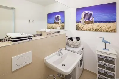 Ein Badezimmer in der Unterkunft Strandglück Haus A Strandglück Appartement 8A StrandGutFinder de