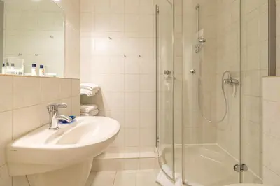 Ein Badezimmer in der Unterkunft Residenz am Hang Residenz am Hang Appartement 313