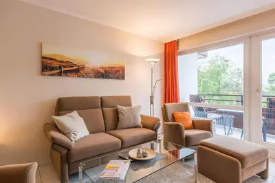 Ein Sitzbereich in der Unterkunft Residenz am Hang Residenz am Hang Appartement 313