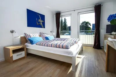 Ein Bett oder Betten in einem Zimmer der Unterkunft Kurparkresidenz Kurparkresidenz Appartement 5