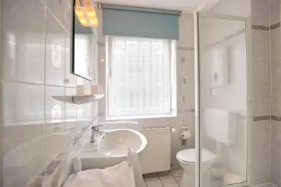 Ein Badezimmer in der Unterkunft Haus Parkblick Parkblick Appartement 2