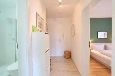 Ein Bett oder Betten in einem Zimmer der Unterkunft Haus Parkblick Parkblick Appartement 4