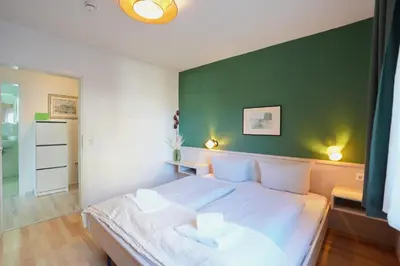 Ein Bett oder Betten in einem Zimmer der Unterkunft Haus Parkblick Parkblick Appartement 4