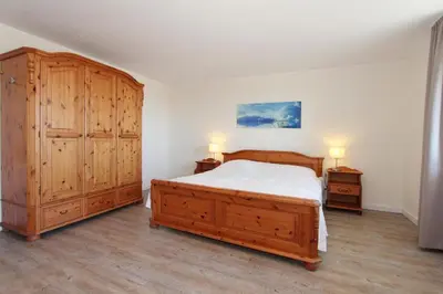 Ein Bett oder Betten in einem Zimmer der Unterkunft Feriendomizil Strandblick Feriendomizil Strandblick Appartement 3 MeerStrand