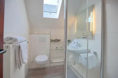 Ein Badezimmer in der Unterkunft Doppelhaushälfte Am Knurrhahn Am Knurrhahn Appartement 2