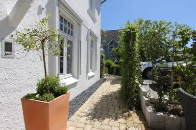 Ein Garten an der Unterkunft Villa Schöneck Villa Schöneck Appartement 1