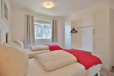 Ein Bett oder Betten in einem Zimmer der Unterkunft Haus Oceanfront, Appartement 11